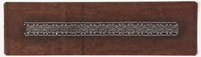 Obi belt Katagami stencil with a border pattern composed of stylised flowers in a diamond grid  with scrolling lines edging the top and bottom