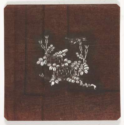 Embroidery Katagami stencil depicting a flowering peony branch with a dragonfly