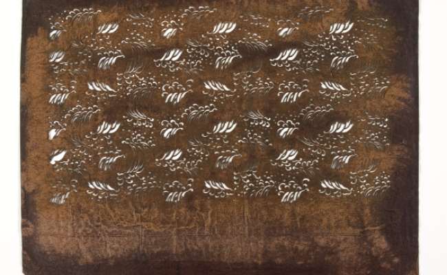Katagami stencil with a repeating pattern of waves and turbulent water