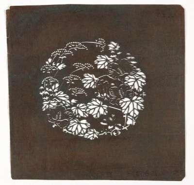 Embroidery Katagami stencil with a roundel containing flowering stems of hibiscus and eastern valerian  or water dropwort