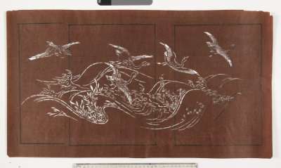 Katagami stencil depicting geese or ducks flying over a rough sea.  Marine flowering  plants are visible amongst the waves.