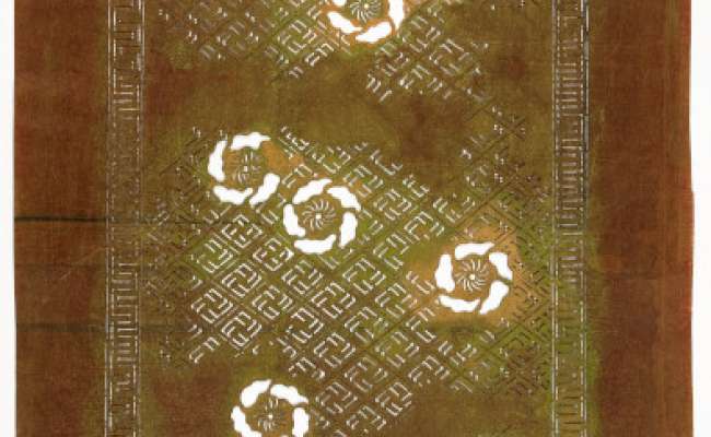 Export Katagami stencil with a design of flowers scattered on a ground of manji  (swastikas) enclosed in diamonds