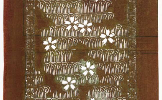 Export Katagami stencil with a design of scattered cherry blossom on a geometric background  pattern