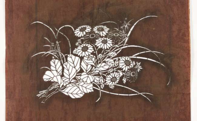Katagami stencil depicting flowering chrysanthemum stems and a grass