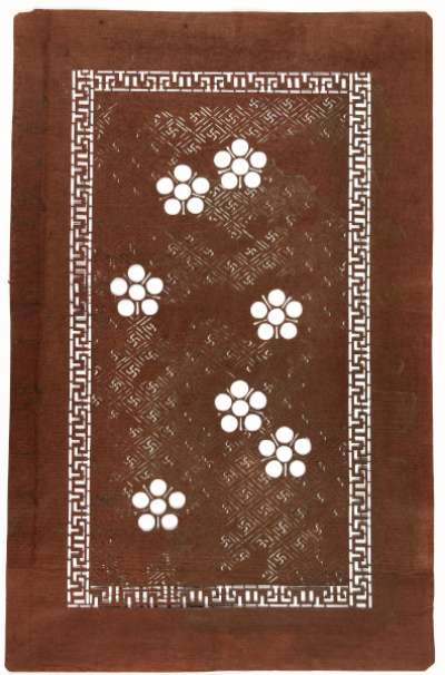Export Katagami stencil with a design of scattered stars against a background of manji  (swastikas) within lozenges
