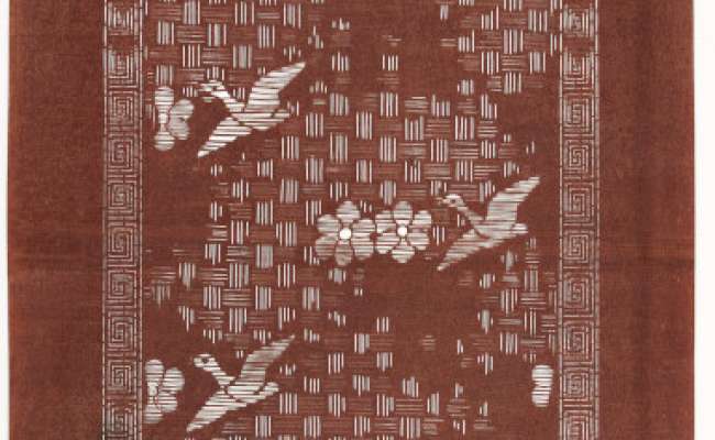 Export Katagami stencil depicting ducks or geese and flowers against a background with a weave  pattern.  The border has a geometric design of angular spirals