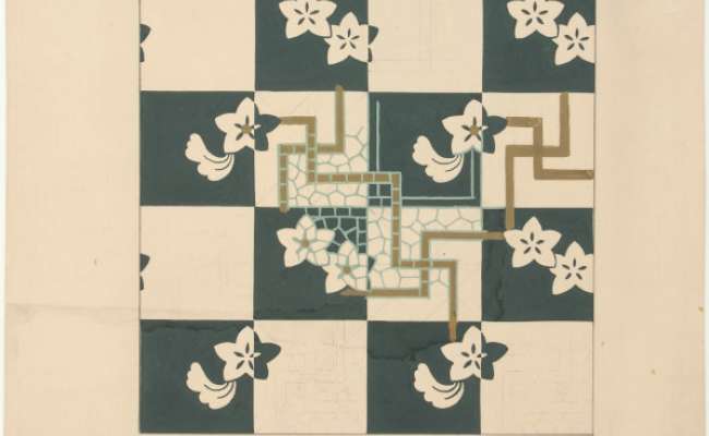 Flower heads and swastika like patterns on a green and white chequered ground