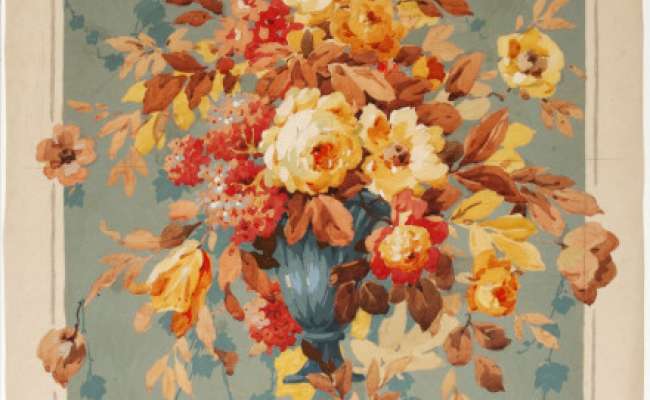 Flowers in autumnal tones in a grey-blue vase