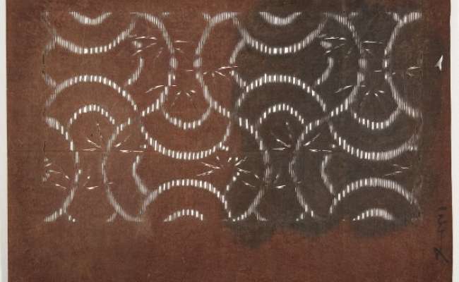 Katagami stencil with an all-over pattern of horizontal and vertical undulating lines, with radiating lines -possibly bamboo leaves