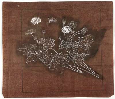 Katagami stencil depicting flowering chrysanthemum stems and a butterfly