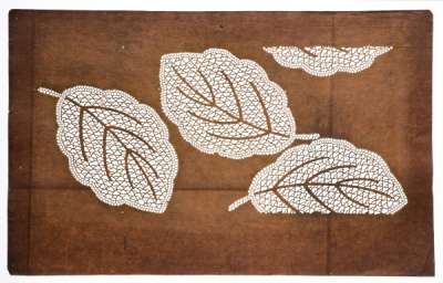 Katagami stencil with a design of leaves with reticulated patterning.  The design of fallen  leaves may be for Autumn.