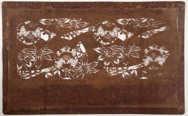 Katagami stencil depicting bamboo alongside twisted strips (possibly banners or poem  cards) and snowflake roundels.