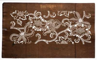 Katagami stencil depicting flowers on scrolling stems in a style which imitates chintz