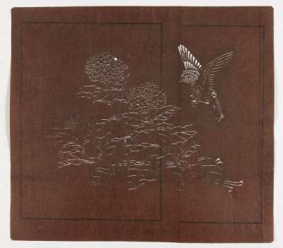 Katagami stencil depicting a flowering hydrangea branch with a bird coming in to land