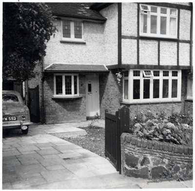 Copy of a black and white photograph of the front exterior of 20 Meadway,  Southgate, London, N14, from around 1960.